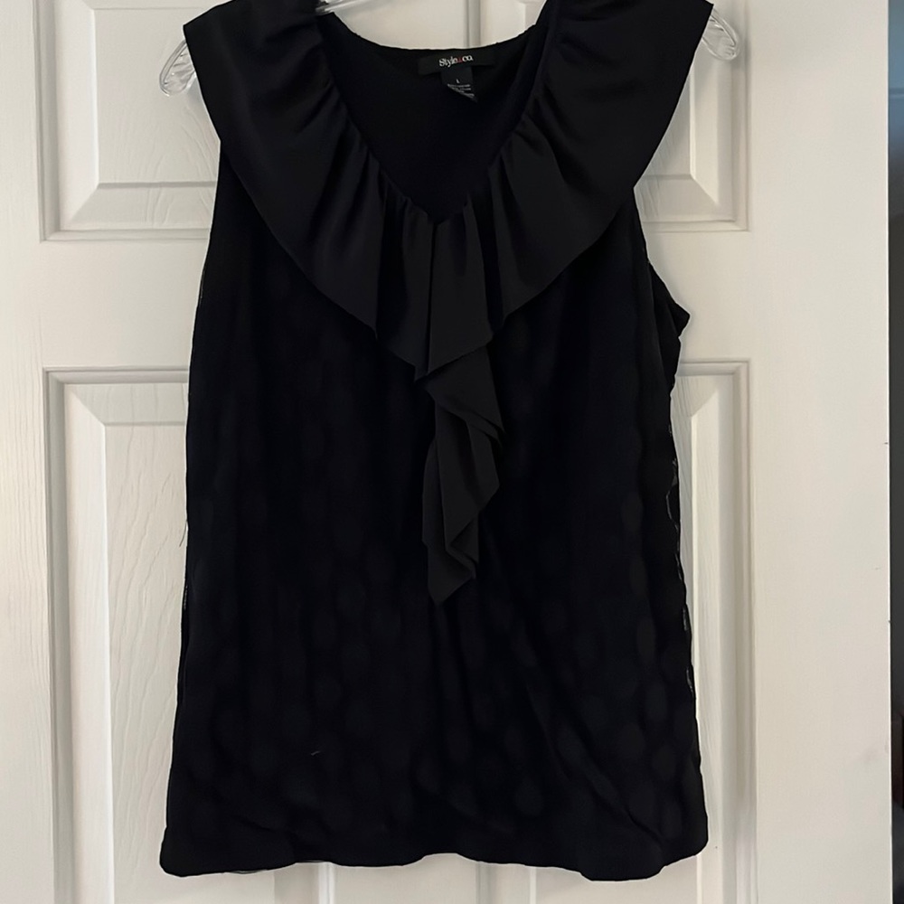 Polka dot black ruffle top